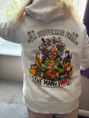 person wearing a white hoodie with a tattoo style design of a woman with lots of cats