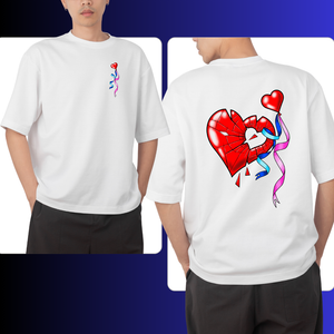White t-shirt with a colorful broken heart design on the front and back, worn by a person.