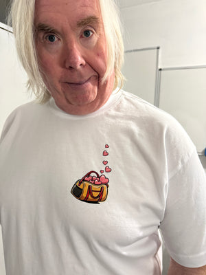 Person wearing a white shirt with a logo on the chest