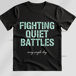 Black t-shirt with 'Fighting Quiet Battles every single day' text on a light gray background