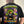 Person wearing a black t-shirt with a colorful cartoon frog graphic design and text.