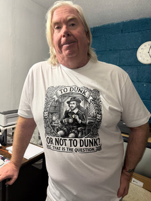 Person wearing a white t-shirt with a graphic design and text of william shakespeare.