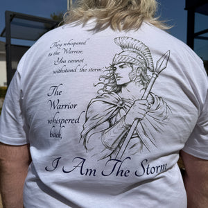 Person wearing a white t-shirt with a graphic design and text on the back.